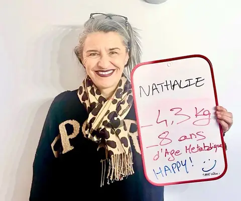 Une membre du club Vitality Nutriclub avec son ardoise de bilan